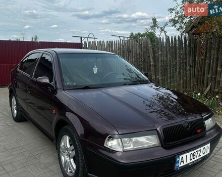Красный Шкода Октавия, объемом двигателя 2 л и пробегом 396 тыс. км за 4400 $, фото 1 на Automoto.ua