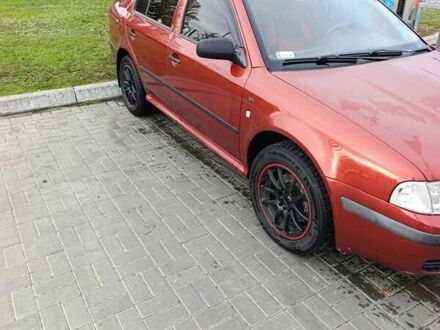 Красный Шкода Октавия, объемом двигателя 1.9 л и пробегом 290 тыс. км за 4500 $, фото 1 на Automoto.ua