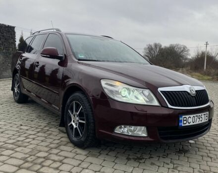 Красный Шкода Октавия, объемом двигателя 2 л и пробегом 243 тыс. км за 8800 $, фото 1 на Automoto.ua