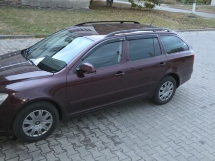 Шкода Октавия 2010 в Днепре (Днепропетровске) на Automoto.ua Красный Шкода Октавия, объемом двигателя 1.6 л и пробегом 266 тыс. км за 6500 $, фото 1 на Automoto.ua