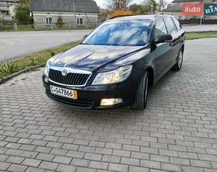 Красный Шкода Октавия, объемом двигателя 2 л и пробегом 215 тыс. км за 8650 $, фото 1 на Automoto.ua