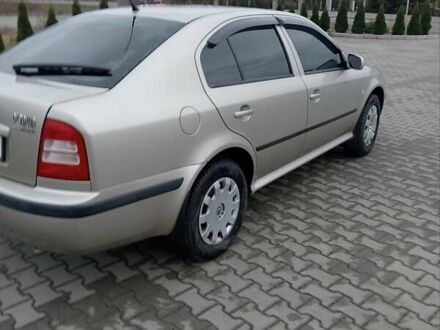 Желтый Шкода Октавия, объемом двигателя 1.6 л и пробегом 210 тыс. км за 4800 $, фото 1 на Automoto.ua