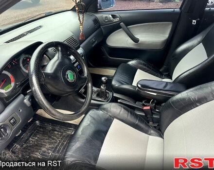 Серый Шкода Октавия, объемом двигателя 1.8 л и пробегом 176 тыс. км за 5300 $, фото 7 на Automoto.ua