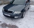 Серый Шкода Октавия, объемом двигателя 1.6 л и пробегом 228 тыс. км за 6000 $, фото 1 на Automoto.ua