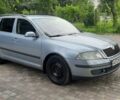 Серый Шкода Октавия, объемом двигателя 1.6 л и пробегом 310 тыс. км за 4300 $, фото 1 на Automoto.ua