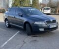 Серый Шкода Октавия, объемом двигателя 1.6 л и пробегом 239 тыс. км за 5700 $, фото 1 на Automoto.ua