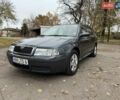 Серый Шкода Октавия, объемом двигателя 1.6 л и пробегом 220 тыс. км за 6400 $, фото 1 на Automoto.ua