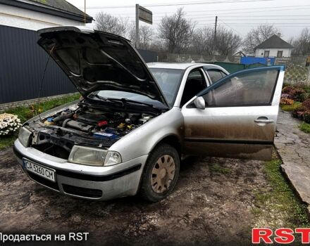 Серый Шкода Октавия, объемом двигателя 1.6 л и пробегом 310 тыс. км за 3500 $, фото 1 на Automoto.ua