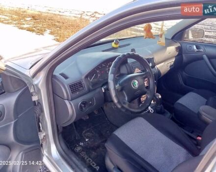 Сірий Шкода Октавія, об'ємом двигуна 2 л та пробігом 306 тис. км за 5600 $, фото 5 на Automoto.ua