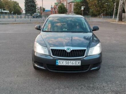Шкода Октавія 2011 у Первомайском на Automoto.ua Сірий Шкода Октавія, об'ємом двигуна 1.6 л та пробігом 307 тис. км за 7500 $, фото 1 на Automoto.ua