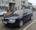 Синий Шкода Октавия, объемом двигателя 2 л и пробегом 318 тыс. км за 4000 $, фото 1 на Automoto.ua