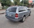 Синий Шкода Октавия, объемом двигателя 1.6 л и пробегом 231 тыс. км за 5400 $, фото 2 на Automoto.ua