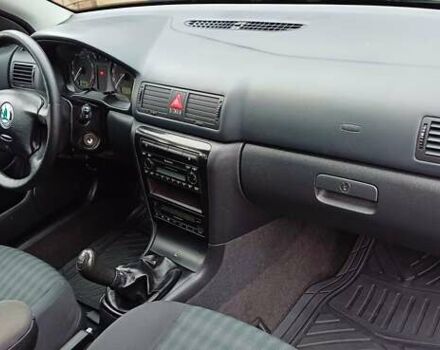 Синий Шкода Октавия, объемом двигателя 1.6 л и пробегом 237 тыс. км за 5250 $, фото 56 на Automoto.ua