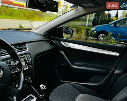 Шкода Октавия 2014 в Полтаве на Automoto.ua Синий Шкода Октавия, объемом двигателя 1.6 л и пробегом 252 тыс. км за 11000 $, фото 29 на Automoto.ua