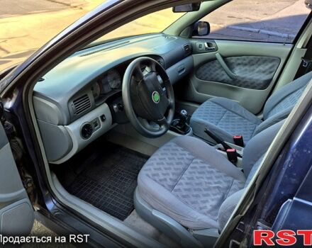 Синий Шкода Октавия, объемом двигателя 1.8 л и пробегом 400 тыс. км за 3500 $, фото 5 на Automoto.ua