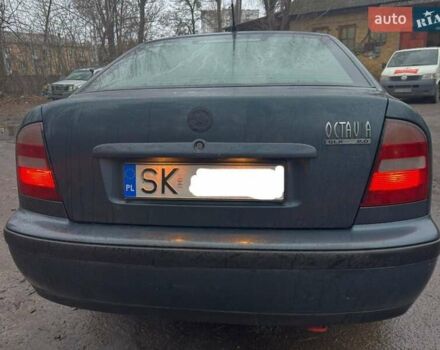 Синий Шкода Октавия, объемом двигателя 2 л и пробегом 300 тыс. км за 1652 $, фото 2 на Automoto.ua