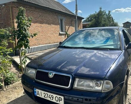 Синий Шкода Октавия, объемом двигателя 1.98 л и пробегом 243 тыс. км за 3600 $, фото 1 на Automoto.ua