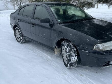 Синий Шкода Октавия, объемом двигателя 1.9 л и пробегом 210 тыс. км за 2000 $, фото 1 на Automoto.ua