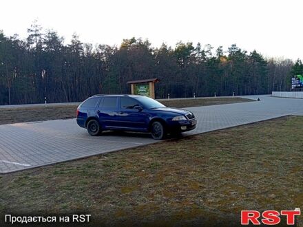 Синий Шкода Октавия, объемом двигателя 2 л и пробегом 231 тыс. км за 5499 $, фото 1 на Automoto.ua