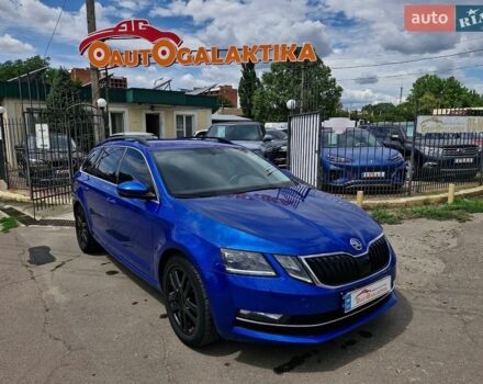 Синий Шкода Октавия, объемом двигателя 2 л и пробегом 248 тыс. км за 13999 $, фото 1 на Automoto.ua