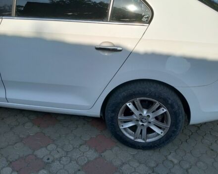 Белый Шкода Рапид, объемом двигателя 1.6 л и пробегом 235 тыс. км за 7500 $, фото 4 на Automoto.ua