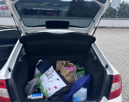 Белый Шкода Рапид, объемом двигателя 1.2 л и пробегом 259 тыс. км за 6500 $, фото 7 на Automoto.ua