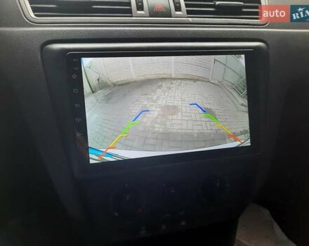 Белый Шкода Рапид, объемом двигателя 1.2 л и пробегом 291 тыс. км за 7000 $, фото 11 на Automoto.ua