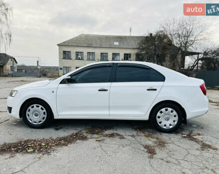 Белый Шкода Рапид, объемом двигателя 1.2 л и пробегом 65 тыс. км за 9300 $, фото 1 на Automoto.ua