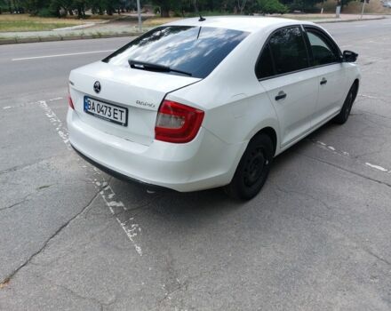 Белый Шкода Рапид, объемом двигателя 1.2 л и пробегом 260 тыс. км за 6600 $, фото 4 на Automoto.ua