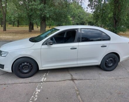 Белый Шкода Рапид, объемом двигателя 1.2 л и пробегом 260 тыс. км за 6600 $, фото 2 на Automoto.ua