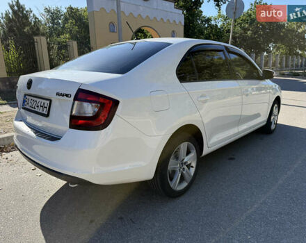 Белый Шкода Рапид, объемом двигателя 1 л и пробегом 142 тыс. км за 9300 $, фото 7 на Automoto.ua