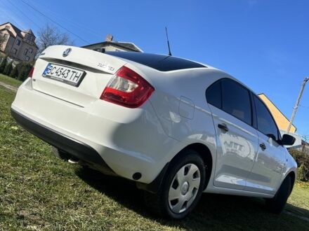 Шкода Рапид 2014 в Яворове на Automoto.ua Белый Шкода Рапид, объемом двигателя 1.2 л и пробегом 305 тыс. км за 7700 $, фото 1 на Automoto.ua
