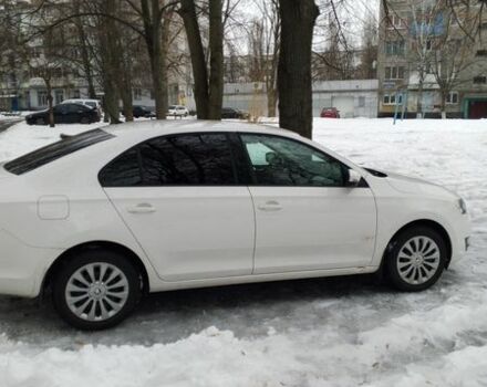 Белый Шкода Рапид, объемом двигателя 1.6 л и пробегом 11 тыс. км за 11300 $, фото 1 на Automoto.ua