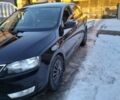 Черный Шкода Рапид, объемом двигателя 1.2 л и пробегом 107 тыс. км за 7200 $, фото 1 на Automoto.ua