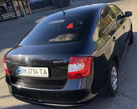 Черный Шкода Рапид, объемом двигателя 1.2 л и пробегом 170 тыс. км за 9700 $, фото 1 на Automoto.ua