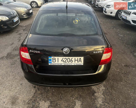 Чорний Шкода Рапід, об'ємом двигуна 1.6 л та пробігом 261 тис. км за 8000 $, фото 7 на Automoto.ua