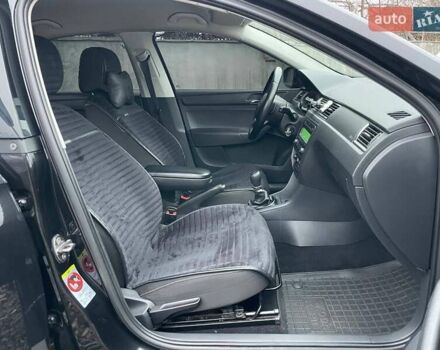 Черный Шкода Рапид, объемом двигателя 1.2 л и пробегом 197 тыс. км за 7690 $, фото 14 на Automoto.ua