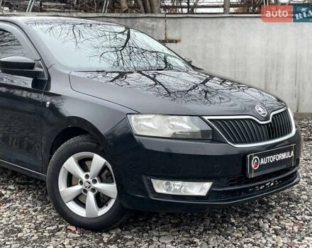 Черный Шкода Рапид, объемом двигателя 1.2 л и пробегом 197 тыс. км за 7690 $, фото 1 на Automoto.ua