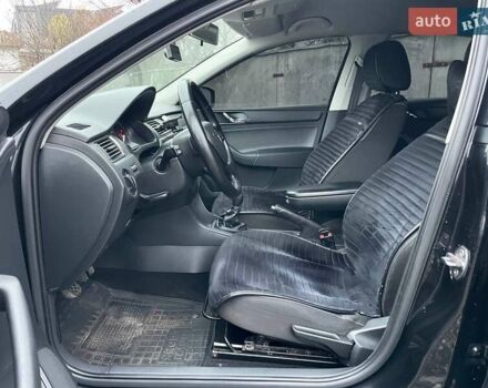 Черный Шкода Рапид, объемом двигателя 1.2 л и пробегом 197 тыс. км за 7690 $, фото 11 на Automoto.ua