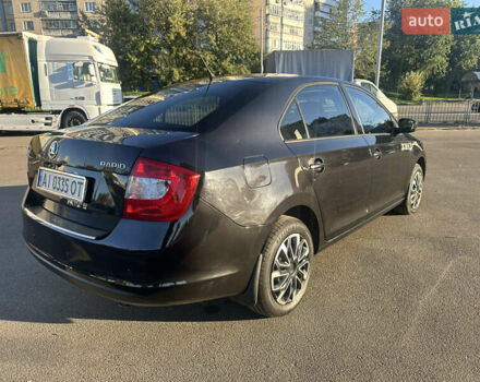 Шкода Рапид 2015 в Киеве на Automoto.ua Черный Шкода Рапид, объемом двигателя 1.2 л и пробегом 231 тыс. км за 7499 $, фото 4 на Automoto.ua