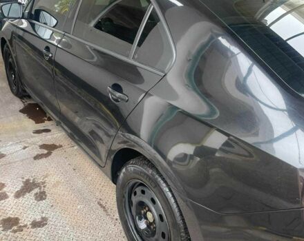 Черный Шкода Рапид, объемом двигателя 1.2 л и пробегом 220 тыс. км за 6291 $, фото 2 на Automoto.ua