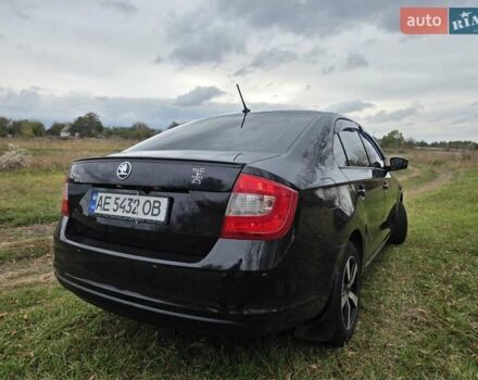 Черный Шкода Рапид, объемом двигателя 1.2 л и пробегом 350 тыс. км за 9000 $, фото 2 на Automoto.ua