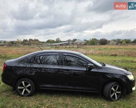 Черный Шкода Рапид, объемом двигателя 1.2 л и пробегом 350 тыс. км за 9000 $, фото 1 на Automoto.ua