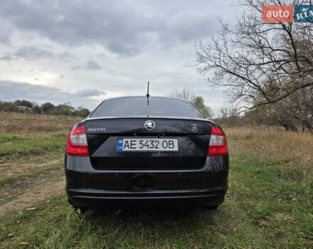 Черный Шкода Рапид, объемом двигателя 1.2 л и пробегом 350 тыс. км за 9000 $, фото 3 на Automoto.ua