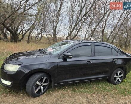 Черный Шкода Рапид, объемом двигателя 1.2 л и пробегом 350 тыс. км за 9000 $, фото 6 на Automoto.ua