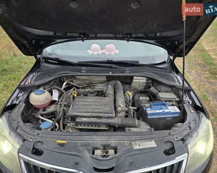 Черный Шкода Рапид, объемом двигателя 1.2 л и пробегом 350 тыс. км за 9000 $, фото 13 на Automoto.ua