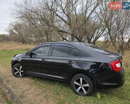 Черный Шкода Рапид, объемом двигателя 1.2 л и пробегом 350 тыс. км за 9000 $, фото 8 на Automoto.ua
