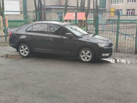 Черный Шкода Рапид, объемом двигателя 1.6 л и пробегом 160 тыс. км за 10500 $, фото 1 на Automoto.ua