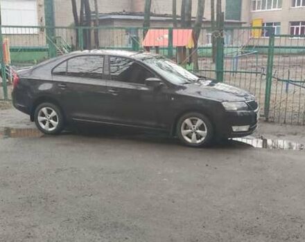 Черный Шкода Рапид, объемом двигателя 1.6 л и пробегом 160 тыс. км за 10500 $, фото 1 на Automoto.ua