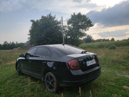 Шкода Рапид 2013 в Камень-Каширский на Automoto.ua Черный Шкода Рапид, объемом двигателя 1.6 л и пробегом 230 тыс. км за 7500 $, фото 1 на Automoto.ua